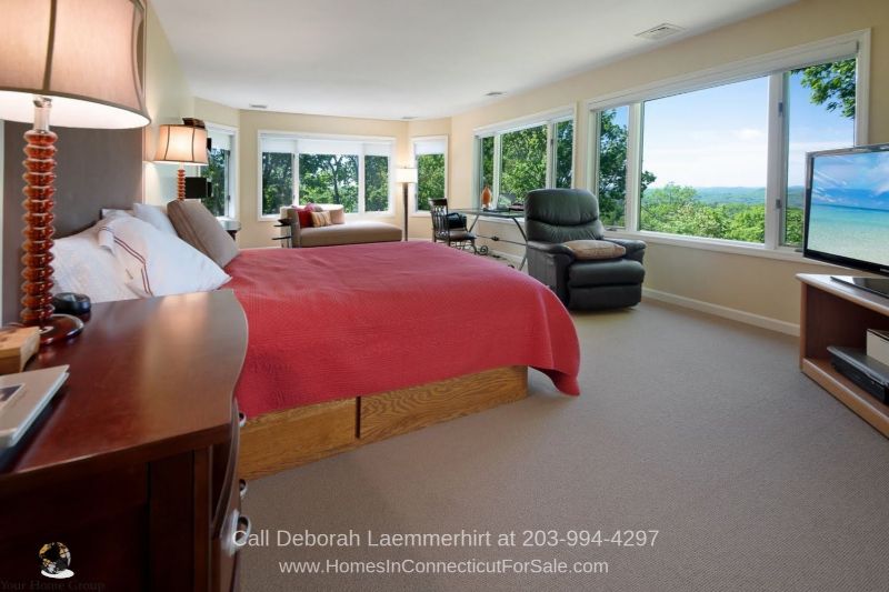 New Fairfield CT Homes - The master bedroom of this New Fairfield property is large and offers panoramic views of the surrounding countryside.